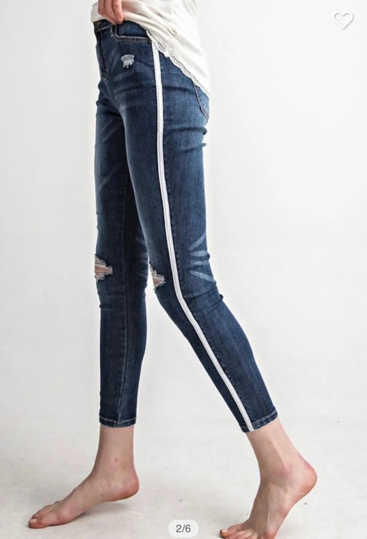 Distressed Skinny jeans with white stripe side detail